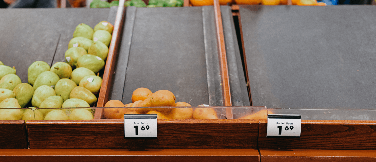 Fruits need restocking on a superstore's shelf