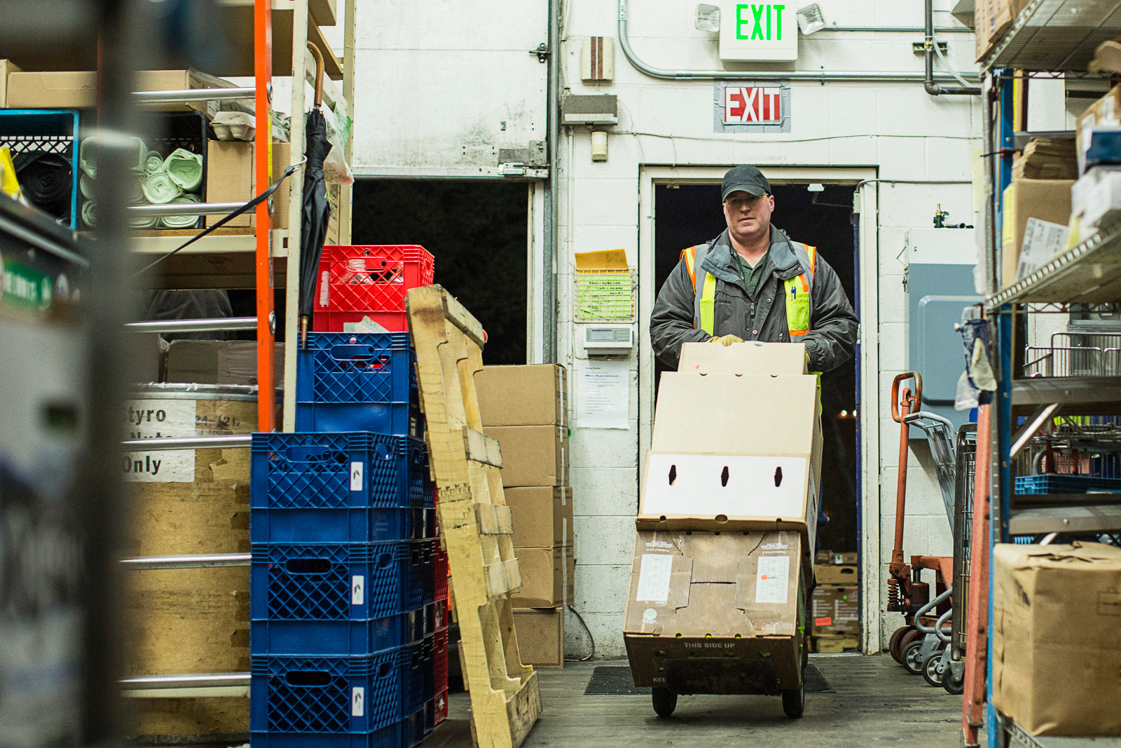 Warehouse worker moving boxes